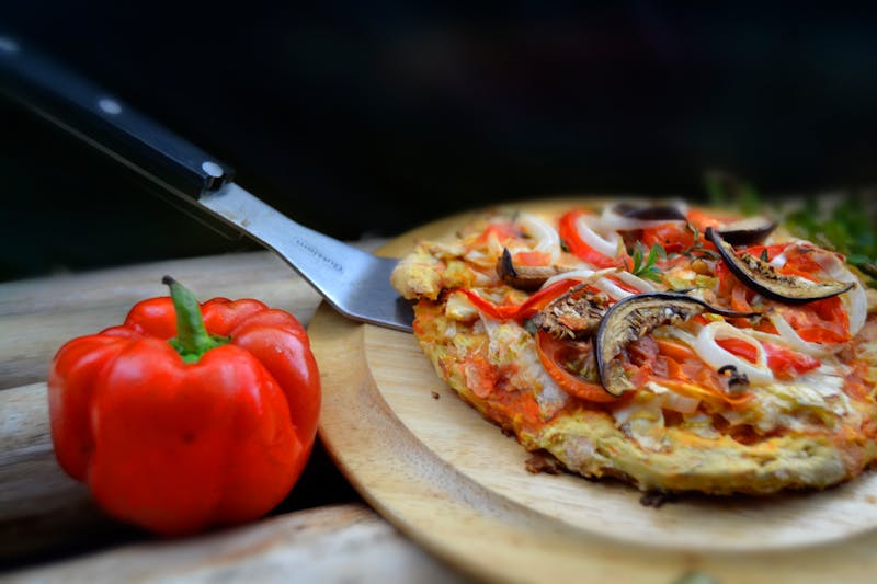 BBQ Chicken Pizza with smoky sauce and red onion