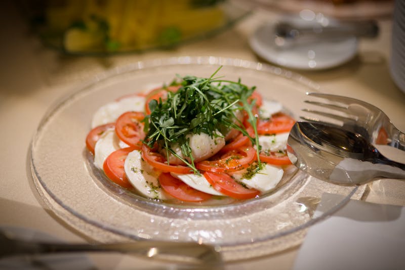 Arugula and shaved Parmesan salad with lemon dressing